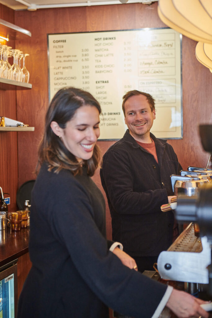 Tide members, Inas and Joe, making coffee